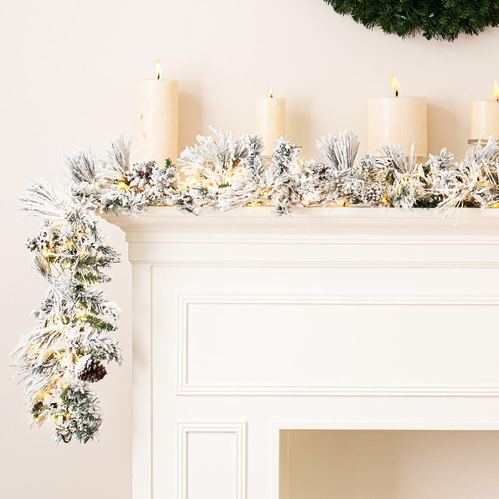 Vickerman 9' x 14" Flocked Atka Artificial Christmas Garland Warm White LED lights.