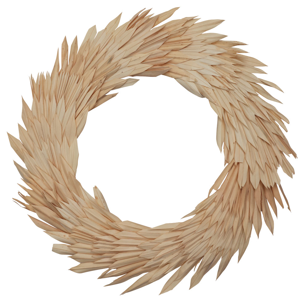 Vickerman Natural Botanicals 24" Bleached Palm Sun Wreath. This wreath measures 24 inches in diameter. It features bleached palm sun leaves on a coco fiber base. This is a dried and preserved natural product.