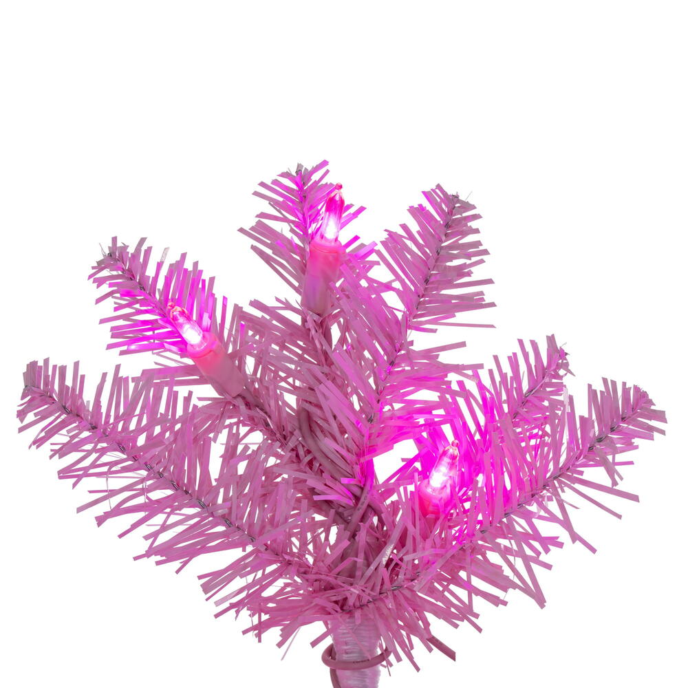 Vickerman 7.5' x 32" Pink Pencil Artificial Pre-Lit Christmas Tree with 450 Dura-Lit® Pink LED Mini Lights. It measures 90 inches tall, and 28 inches wide, which is considered a pencil profile. This tree boasts 965 tips for a realistic look. Pre-lit with