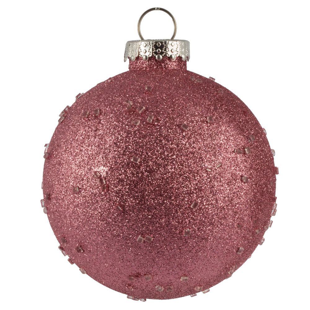 Vickerman 4.75" Mauve Ice Ball Ornament. This textured ornament has a rough and icy look with a hint of delicate sparkle. Incorporate these ornaments into your holiday design for added texture. Includes 4 pieces per pack. Made with shatterproof plastic.