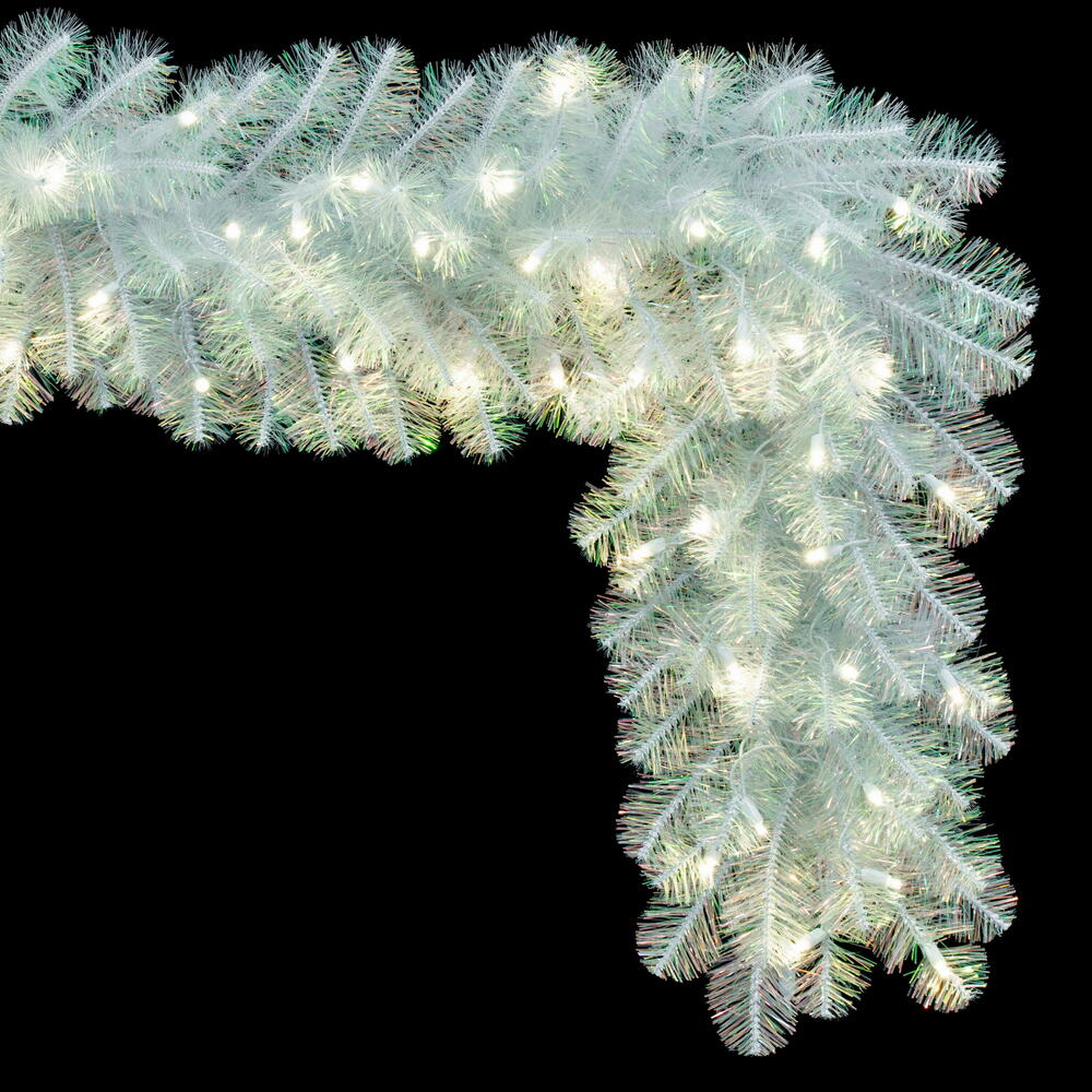 Vickerman 9' x 14" White Iridescent Artificial Pre-Lit Garland with 100 Pure White LED 5MM Lights. It measures 108 inches long and 14 inches wide. This garland boasts 280 PVC tips for a realistic look. Pre-lit with 100 Pure White 5MM, or Wide Angle, Singl