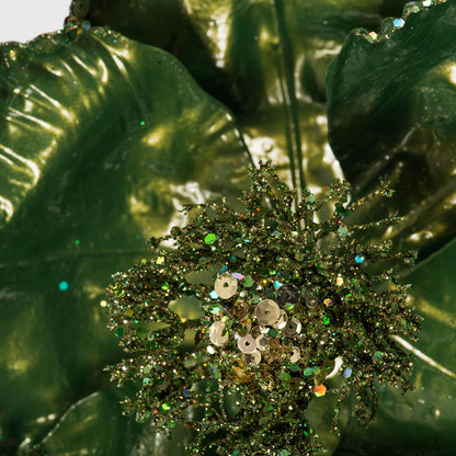 Vickerman 14" Artificial Green Pearl Glitter Poppy 8" Flower Head 3/Bag. This flower features eye-catching glitter accents that will take your decorating project to the next level. Includes 3 pieces per bag.