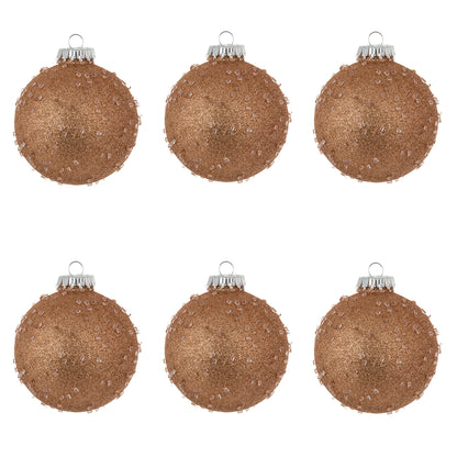 Vickerman 4" Rose Gold Ice Ball Ornament. This textured ornament has a rough and icy look with a hint of delicate sparkle. Incorporate these ornaments into your holiday design for added texture. Includes 6 pieces per pack. Made with shatterproof plastic.