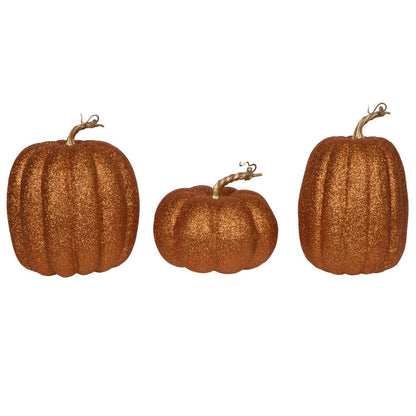 Vickerman 8" Orange Pumpkins Set of 3. Three pieces assorted Fabric pumpkin with polystyrene inner.