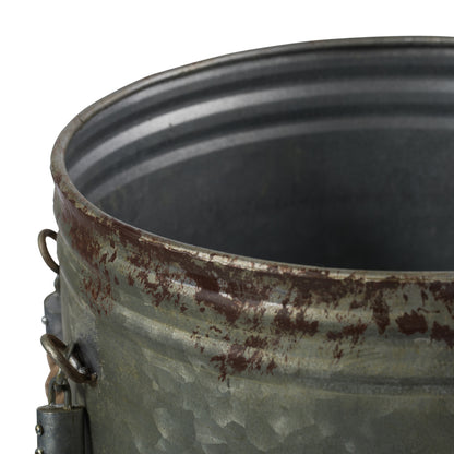 Vickerman 19.5" Rustic Metal Container with Handles. This metal container is the perfect addition to any modern farm style decor. This rustic piece is the perfect addition to any table top setting. It measures 10.5" L x 11" W x 19.5" H.   90% METAL 10% JU