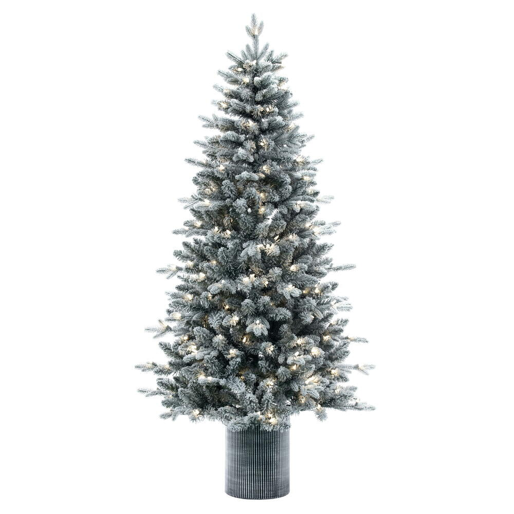 Vickerman 6' x 39" Frosted Potted Spruce Artificial Full Pre-lit Christmas Tree with 200 Dura-Lit® Warm White LED Mini Lights. It measures 78 inches tall and 39 inches wide, which is considered a slim profile. This tree boasts 811 tips for a realistic loo