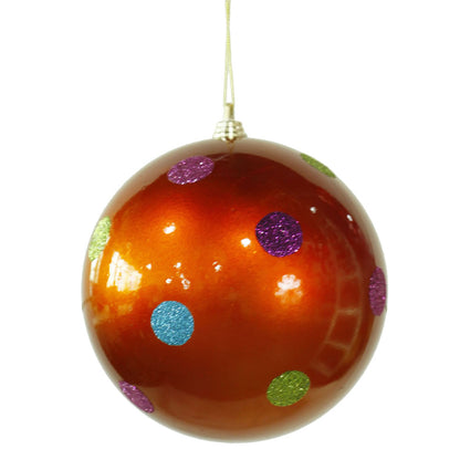 Vickerman 5.5" Burnished Orange Candy Finish Ball Christmas Ornament with Multi-Colored Polka Dots