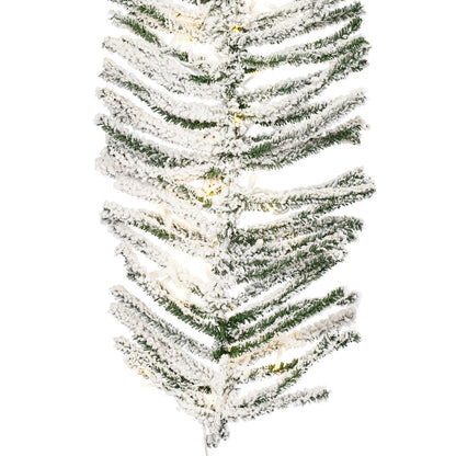 Vickerman 9' x 14" Flocked Pistol Pine Garland with Warm White LED Lights.
