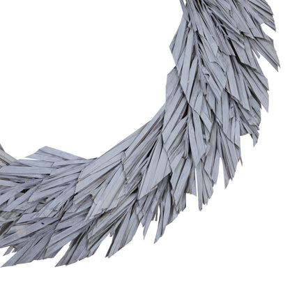 Vickerman Natural Botanicals 24" White Washed Canna Leaf Wreath. This wreath measures 24 inches in diameter. It features white washed canna leaves on a coco fiber base. This is a dried and preserved natural product.