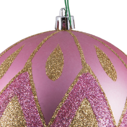 Vickerman 4.75" Pink Matte Ball with Glitter Diamond Pattern. Add variety and sparkle to your holiday arrangement with this matte ornament that features a glitter pattern. Includes 4 pieces per bag. Made with shatterproof plastic. Ornament has a drilled c