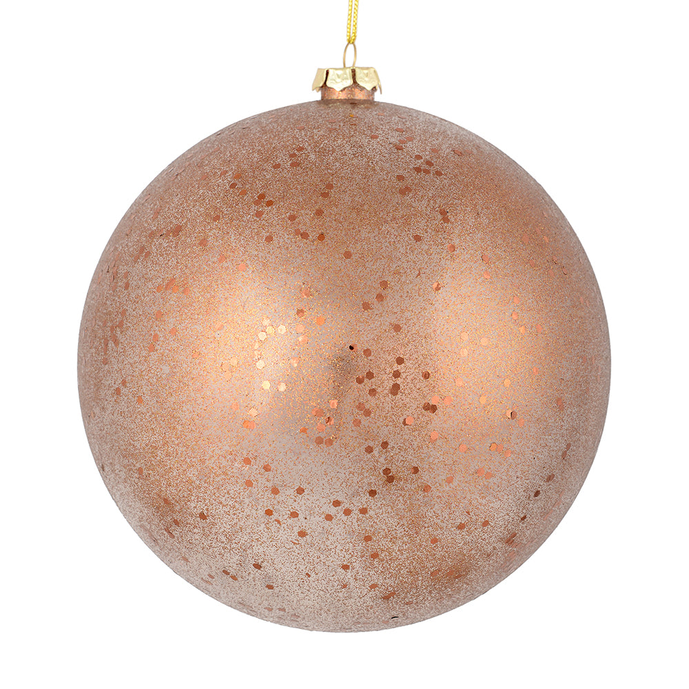 Vickerman 4.75" Mocha Glitter Clear Ball. This ornament features a clear complexion with a dusting of mocha glitter inside. Add a touch of glam to any holiday arrangement with this delicate looking ornament. Made with shatterproof plastic. Includes 4 piec