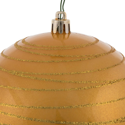 Vickerman 4.75" Honey Gold Candy Finish Ball Ornament with Glitter Lines 4 per Bag