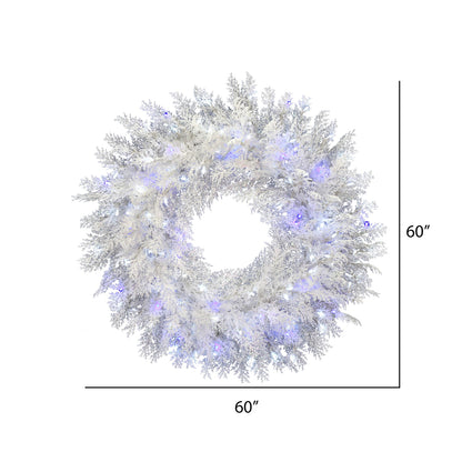 Vickerman 60" Flocked Cedar Pine Artificial Christmas Wreath Pure White and Blue Low Voltage LED Wide Angle Twinkle Lights.