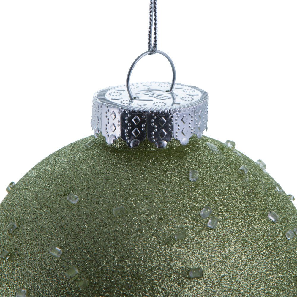 Vickerman 4.75" Celadon Ice Ball Ornament. This textured ornament has a rough and icy look with a hint of delicate sparkle. Incorporate these ornaments into your holiday design for added texture. Includes 4 pieces per pack. Made with shatterproof plastic.