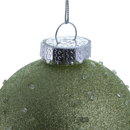 Vickerman 4.75" Celadon Ice Ball Ornament. This textured ornament has a rough and icy look with a hint of delicate sparkle. Incorporate these ornaments into your holiday design for added texture. Includes 4 pieces per pack. Made with shatterproof plastic.