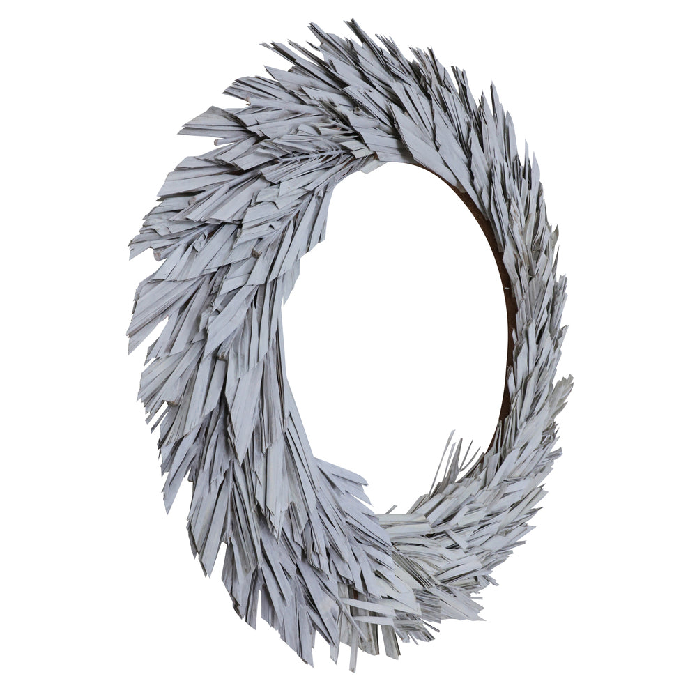 Vickerman Natural Botanicals 24" White Washed Canna Leaf Wreath. This wreath measures 24 inches in diameter. It features white washed canna leaves on a coco fiber base. This is a dried and preserved natural product.