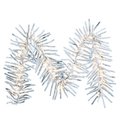 Vickerman 9' x 14" Flocked Pistol Pine Garland with Warm White LED Lights.