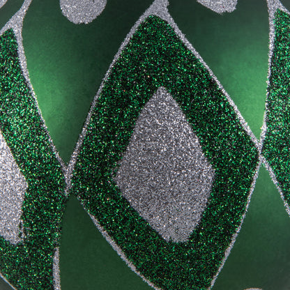 Vickerman 4.75" Emerald Matte Ball with Glitter Diamond Pattern. Add variety and sparkle to your holiday arrangement with this matte ornament that features a glitter pattern. Includes 4 pieces per bag. Made with shatterproof plastic. Ornament has a drille