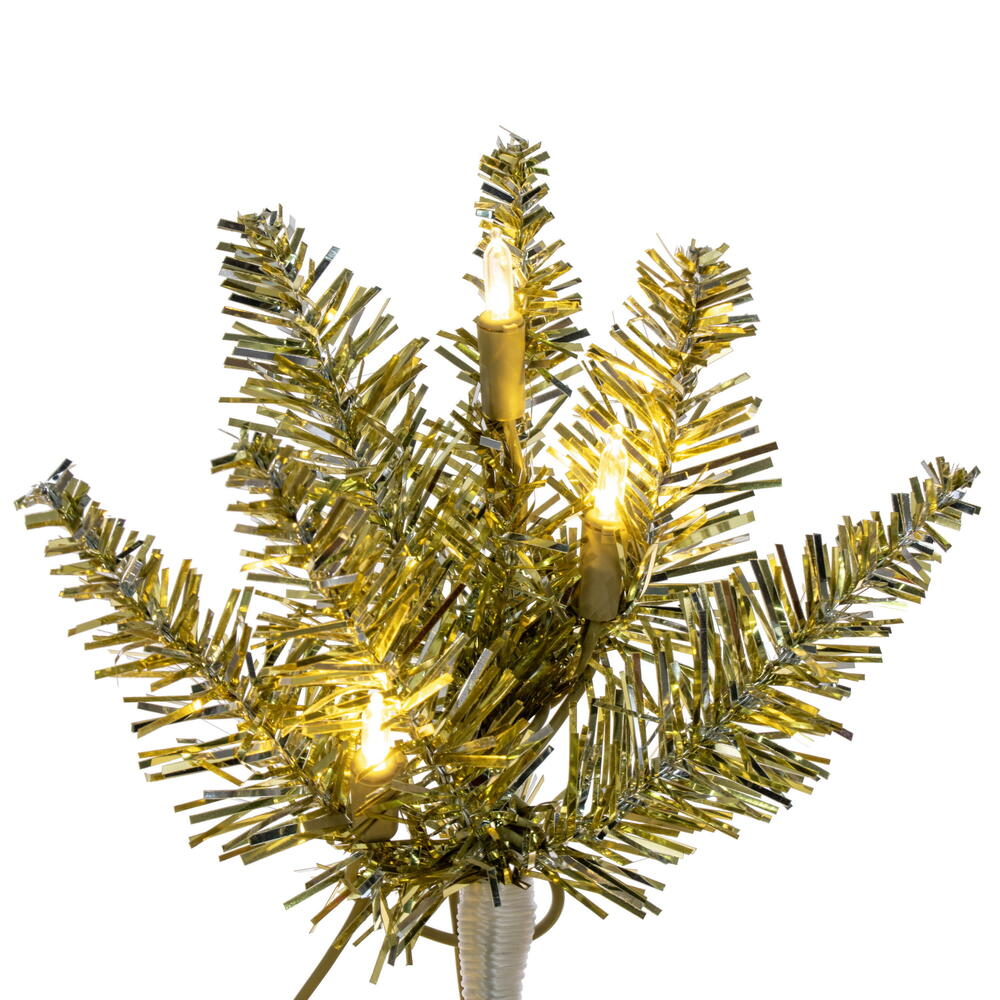 Vickerman 9.5' x 42" Champagne Pencil Artificial Pre-Lit Christmas Tree with 700 Dura-Lit® Warm White LED Mini Lights. It measures 114 inches tall, and 28 inches wide, which is considered a pencil profile. This tree boasts 1700 tips for a realistic look.