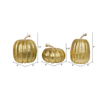 Vickerman 8" Gold Pumpkins Set of 3. Three pieces assorted Fabric pumpkin with polystyrene inner.