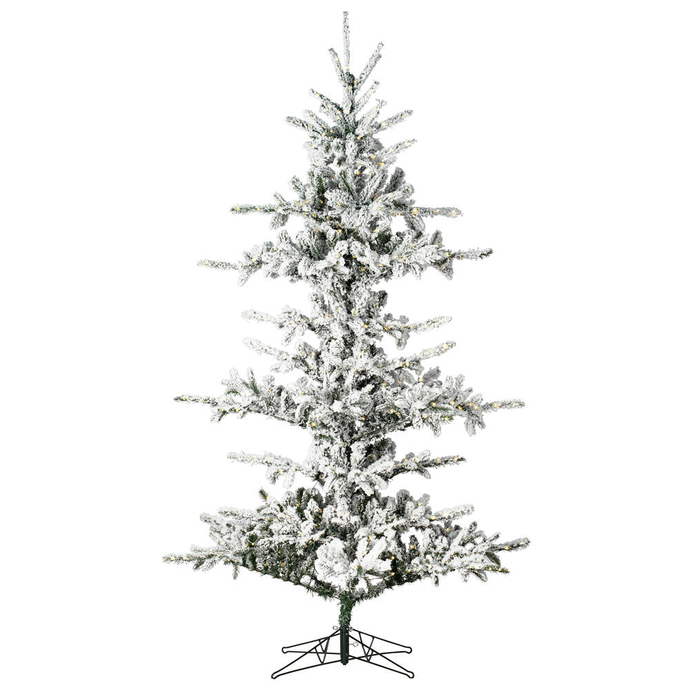 Vickerman 7.5' x 57" Flocked Yukon Display Artificial Christmas Tree with Warm White LED Lights.