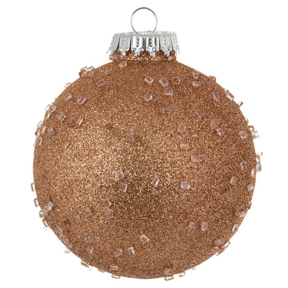 Vickerman 4" Rose Gold Ice Ball Ornament. This textured ornament has a rough and icy look with a hint of delicate sparkle. Incorporate these ornaments into your holiday design for added texture. Includes 6 pieces per pack. Made with shatterproof plastic.