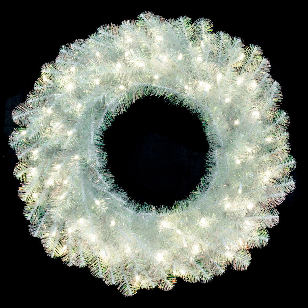 Vickerman 30" White Iridescent Artificial Pre-Lit Wreath with 70 Pure White LED 5MM Lights. It measures 30 inches wide. The diameter is measured from the end of one tip across to the other with the wreath tips extended outward. This wreath boasts 180 PVC