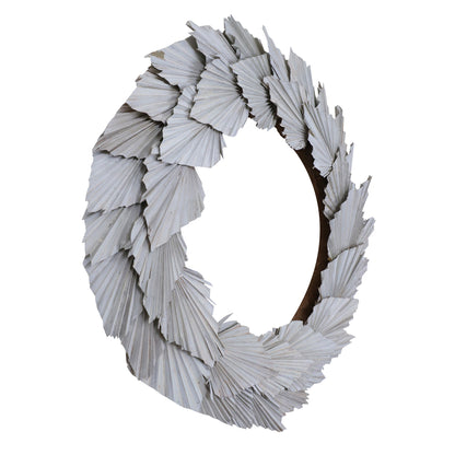 Vickerman Natural Botanicals 24" White Washed Palm Spear Wreath. This wreath measures 24 inches in diameter. It features white washed palm spear leaves on a coco fiber base. This is a dried and preserved natural product.