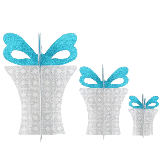 Vickerman 9-16-22" Silver/White/Turquoise Foam Gift Set of 3. This set includes three foam board gift boxes that measure 9 16 and 22 inches tall. These foam boards are easy to put together by sliding one onto the other. These make a great table top additi