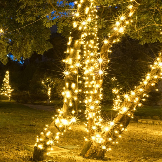 RANDOM TWINKLE 100-LITE 5MM ICICLE LIGHT SET; WARM WHITE BULBS; GREEN WIRE, Approx. 8'2" Long